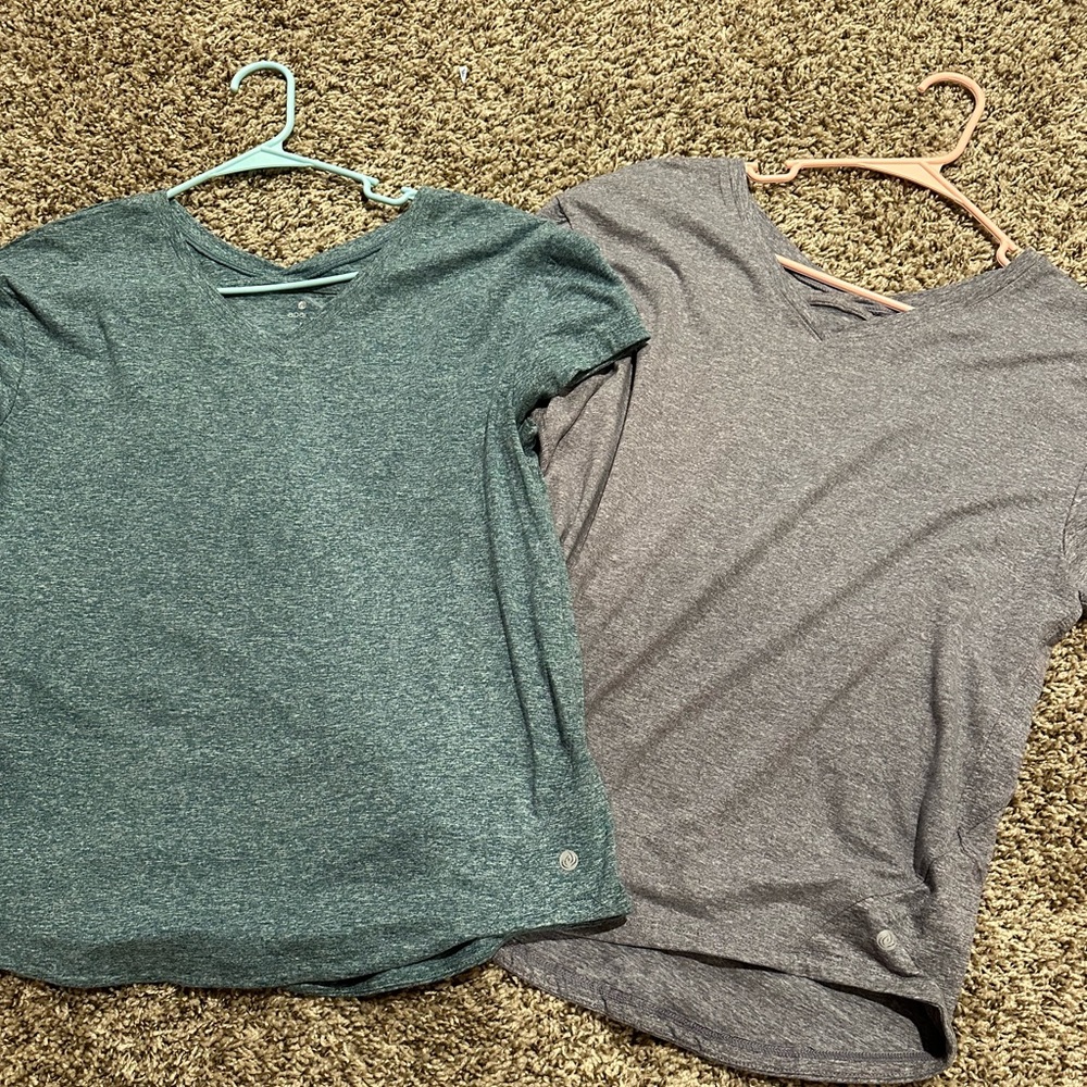 Two workout shirts women’s medium got them from b2 outlet selling as a pair!
